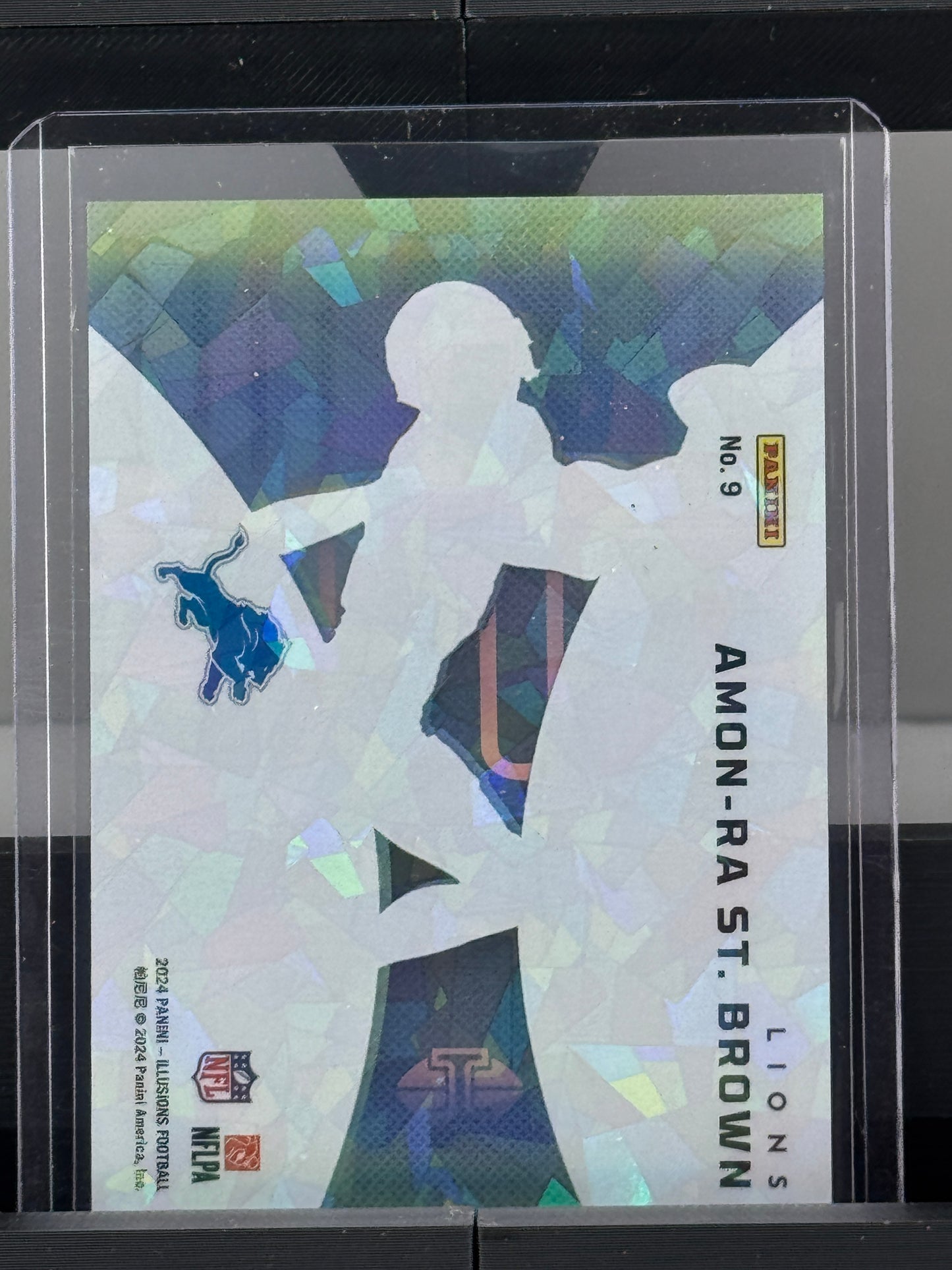 2024 Illusions #9 Amon-Ra St. Brown Clutch Sapphire SP Cracked Ice Detroit Lions