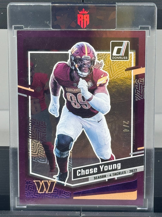 2023 Donruss #293 Chase Young Purple Prizm 2/4 Washington Commanders