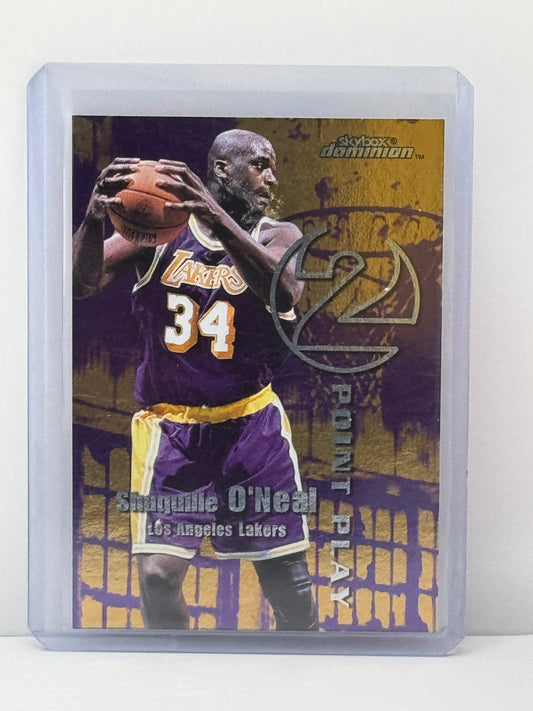 1999 Skybox Dominion 2 puntos Jugada Shaquille Oneal Michael Olowokandi