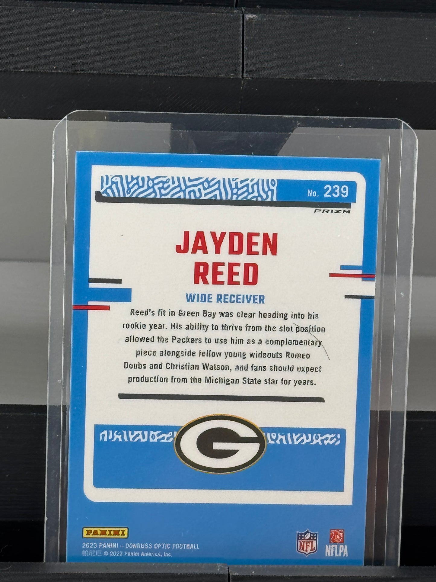 2023 Donruss Optic #239 Jayden Reed Green Velocity Prizm RC Green Bay Packers